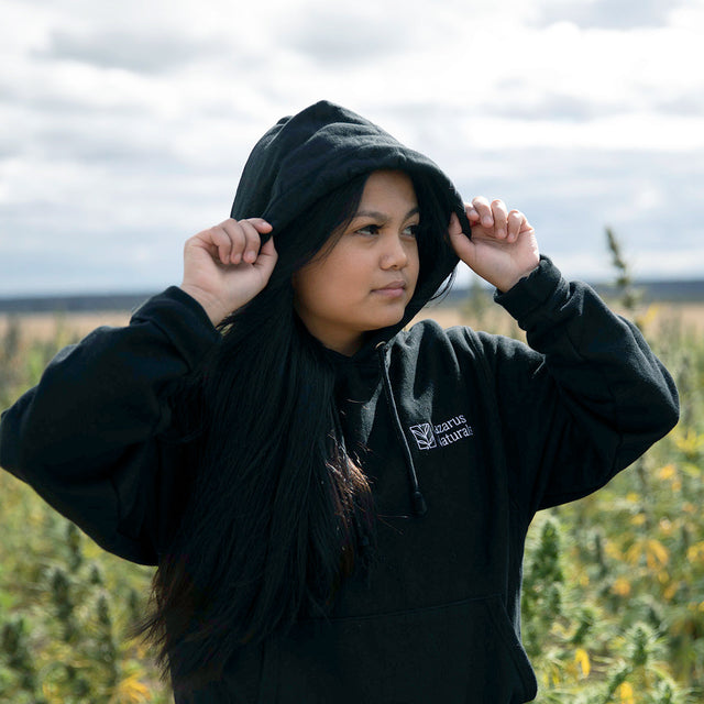 person in Lazarus Naturals hoodie